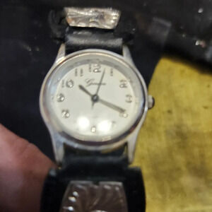 GENEVA Quartz With a SilverToned accented leather strap